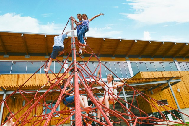 Children Posing On The Top Of Childrens Playscape