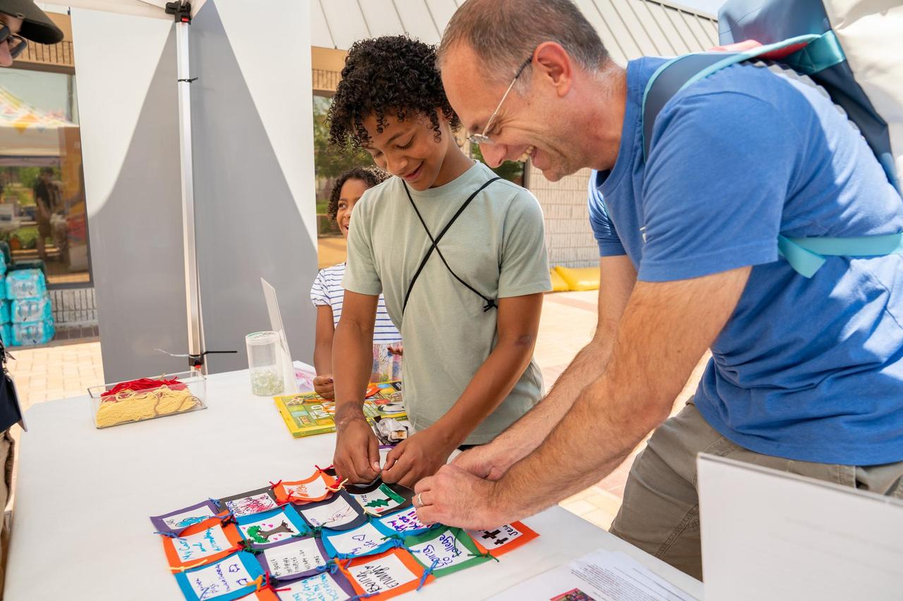 Volunteer Helping Young Teenager