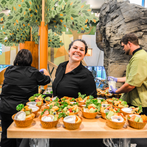 Caterer Showing Off The Food Shes Made