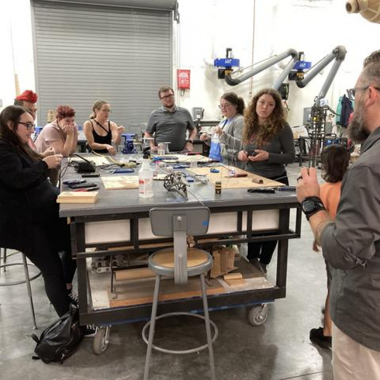 Group Of Adult Makers In Class Together