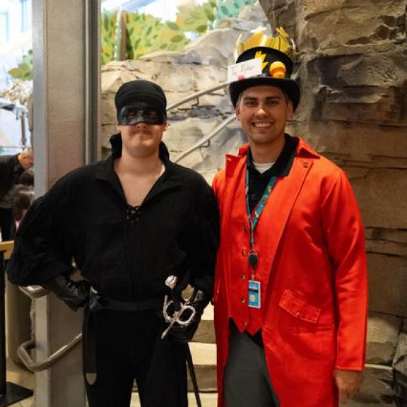 Two People In A Zorro And Magician Costume