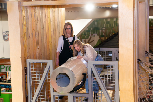 Two Women Playing With Exhibit