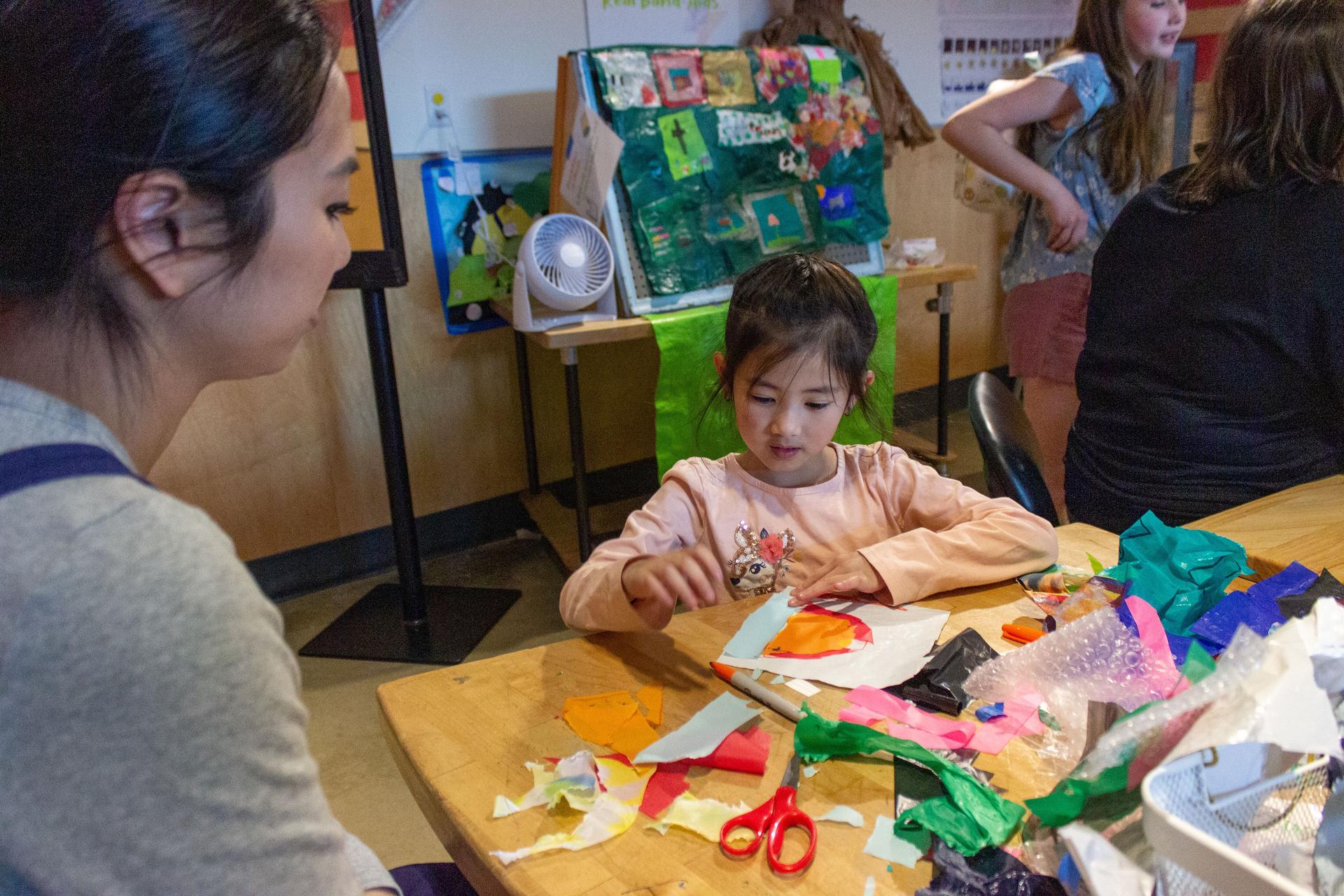 Mom Watching Daughter Play In Tinkering Hub