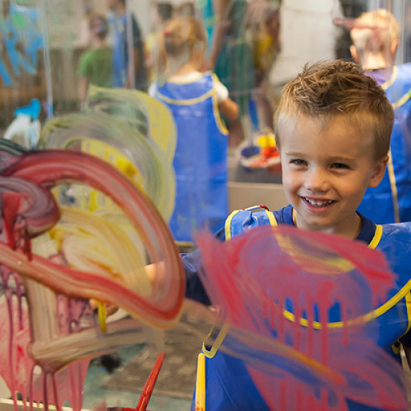 Young Boy Smiling At His Window Art