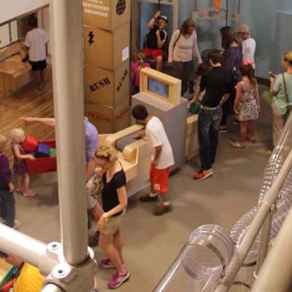 Overhead Photo of People Enjoying Lift Load And Haul Exhibit