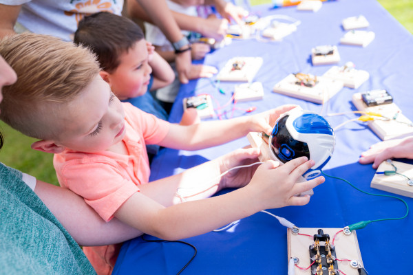 Young Boy Creating a Robot