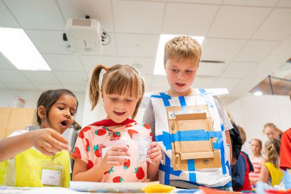 Young Children Making Play Costumes