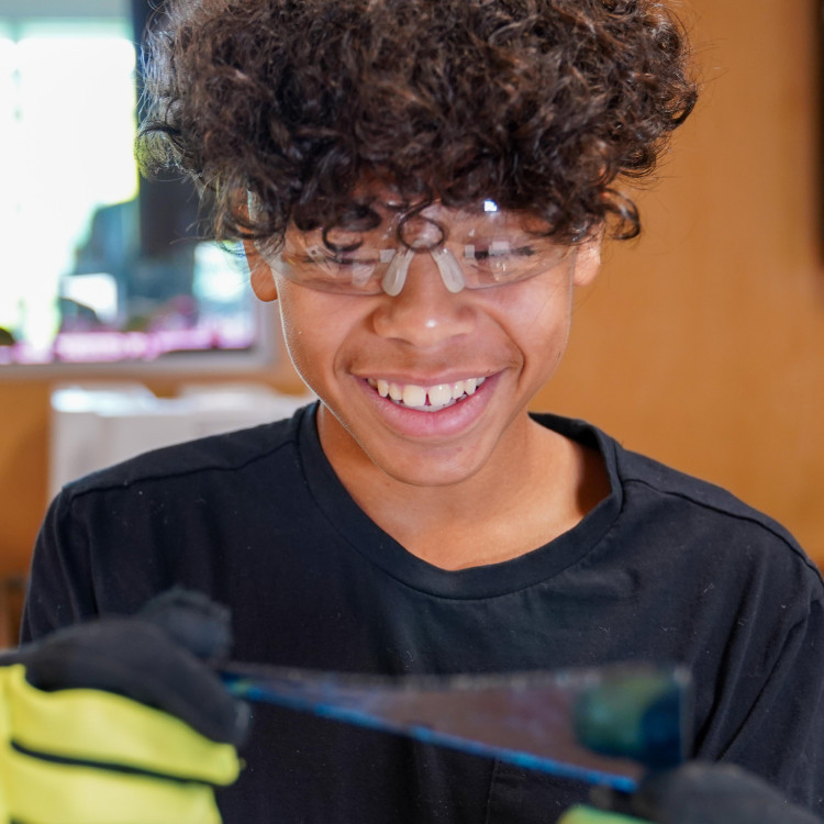 Boy Working On Project During YouthMakers