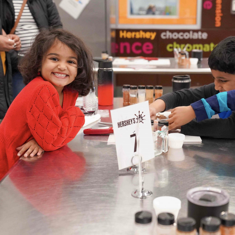 Girl Smiling In Hersheys Lab