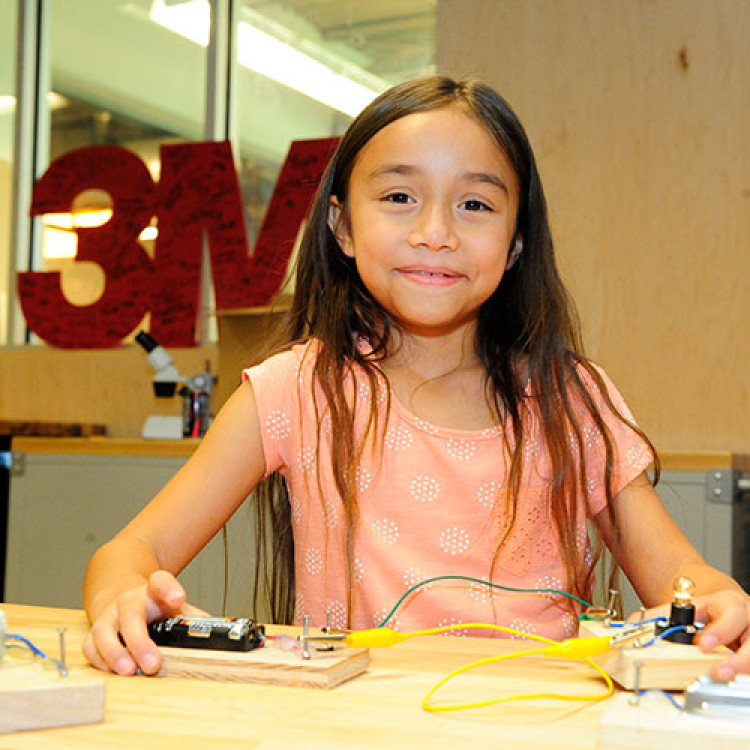 Girl Making Circuit In 3M Tinkering Hub