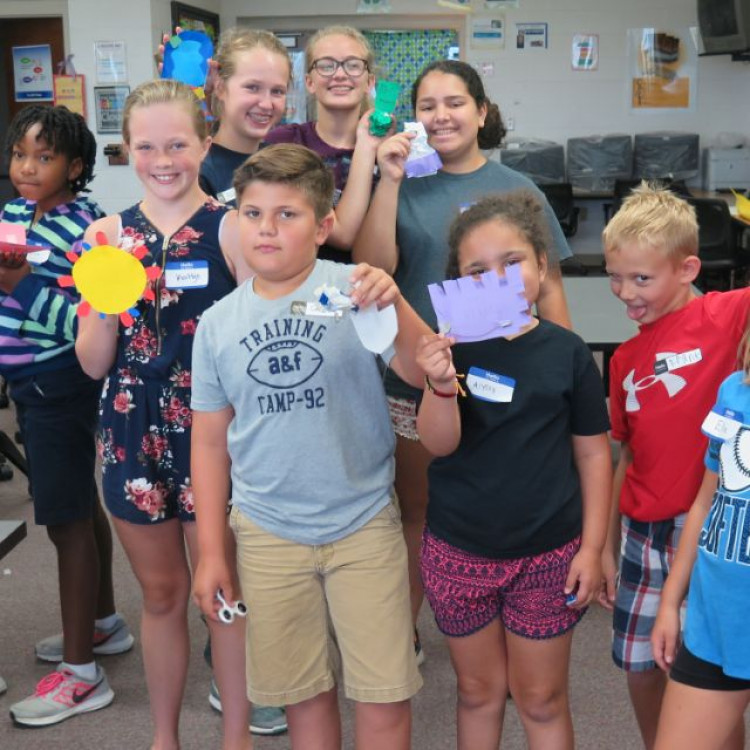 Making Spaces Group Holding Up Their Projects