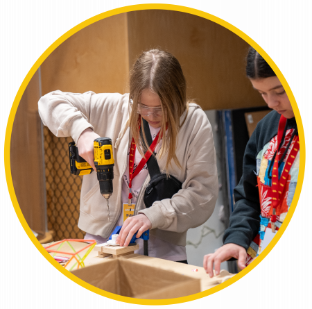 Girl Using Power Drill For Her Project