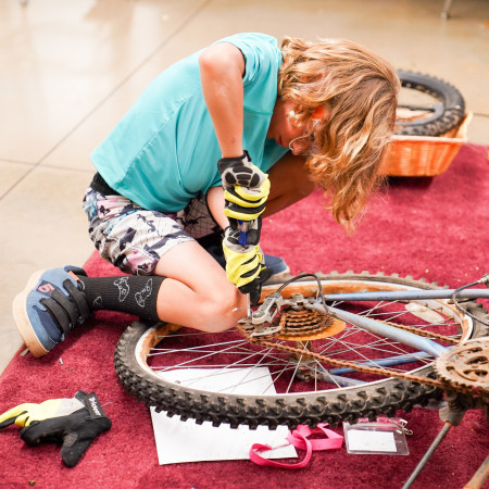 Boy Disassembling Bicycle Gears