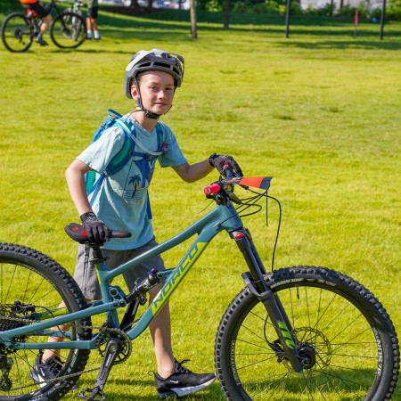 Boy Standing Alongside Bike Posing For Photo