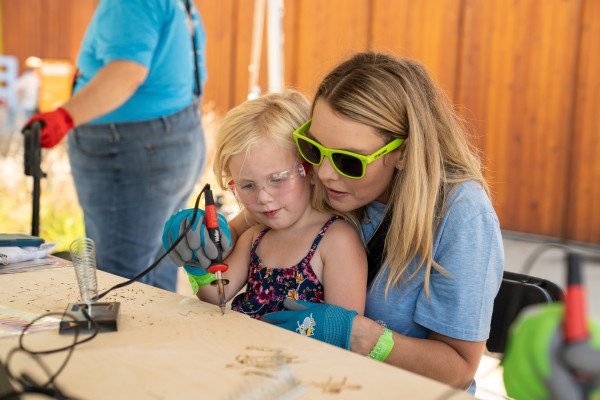 Mom with daughter wood burning tinkerfest small size v2